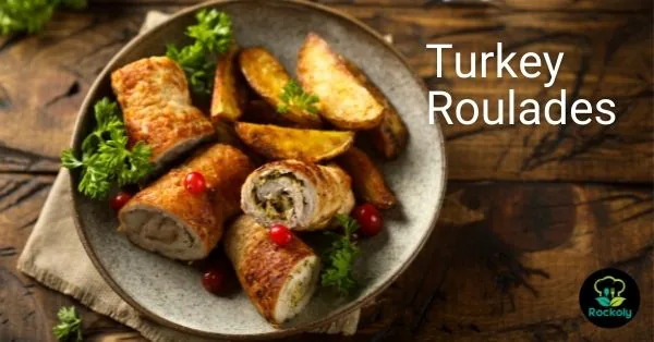 Banner reading Turkey Roulades over sliced stuffed turkey rolls with potato wedges and cranberries