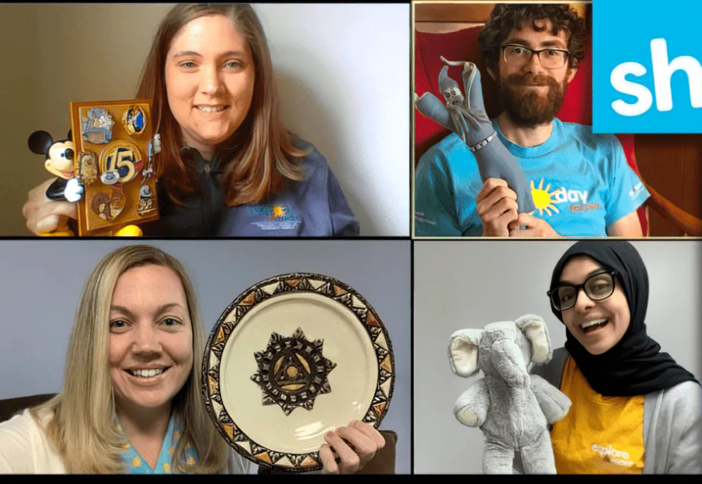 Four people on a video call each holding up a personal keepsake for a virtual show and tell