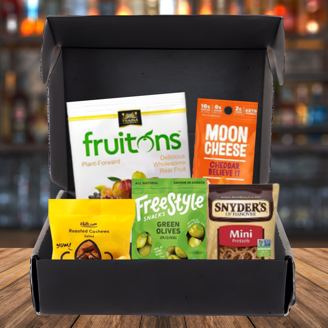 Gift box of bar snacks including Fruitons, Moon Cheese, Snyder's pretzels, green olives and roasted cashews