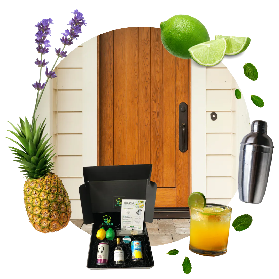 Happy hour cocktail kit box delivered on a doorstep with lime, pineapple, shaker and a mixed drink