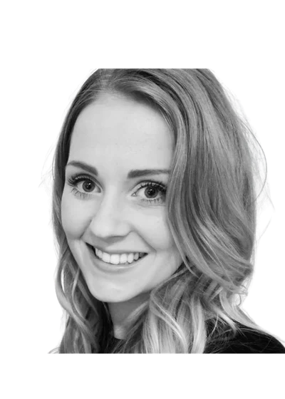 Leslie Schwarz, Rockoly co-founder and COO, smiling in a black-and-white headshot