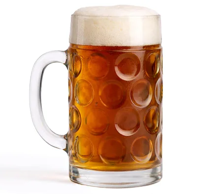 Dimpled glass stein of amber Oktoberfest lager topped with a thick foam head