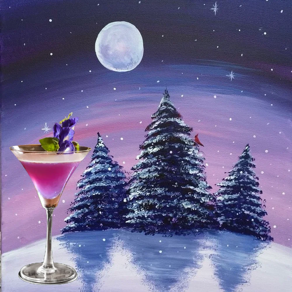 Pink cocktail in a martini glass, garnished with a flower, in front of a painting of snowy pines under a full moon