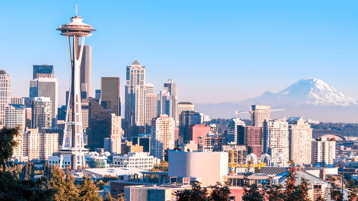 Seattle skyline with the Space Needle in the foreground and Mount Rainier on the horizon